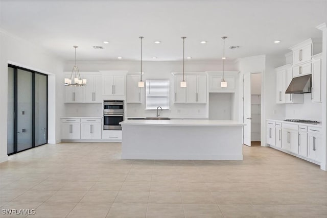 11902 Raggio Dr, Fort Myers, FL 33913 - kitchen featuring double oven, under cabinet range hood, a sink, white cabinets, and recessed lighting