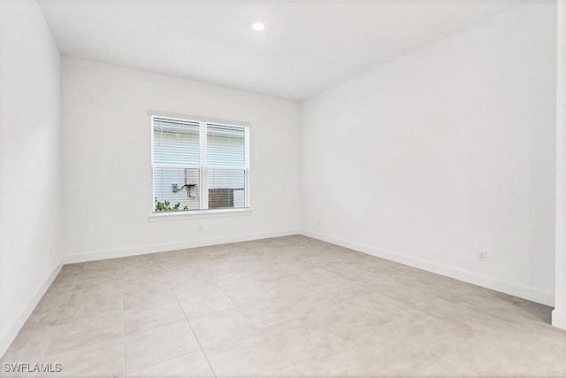 11902 Raggio Dr, Fort Myers, FL 33913 - unfurnished room with baseboards and recessed lighting