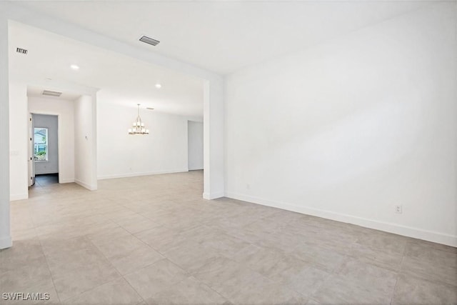 11902 Raggio Dr, Fort Myers, FL 33913 - spare room with a chandelier, baseboards, and recessed lighting