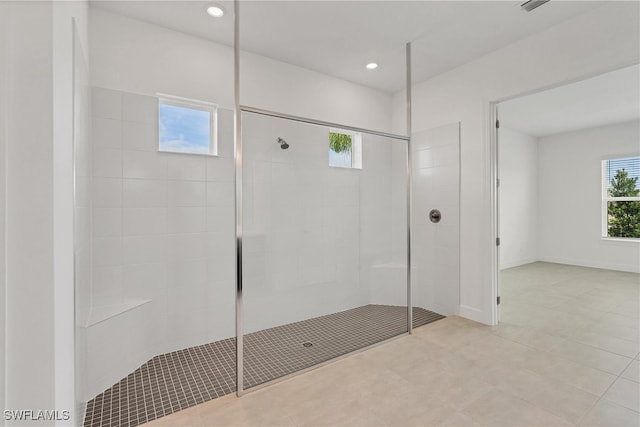 bathroom featuring tiled shower