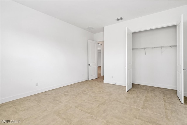 unfurnished bedroom featuring a closet