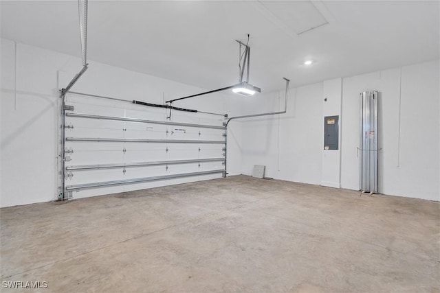 garage featuring a garage door opener and electric panel