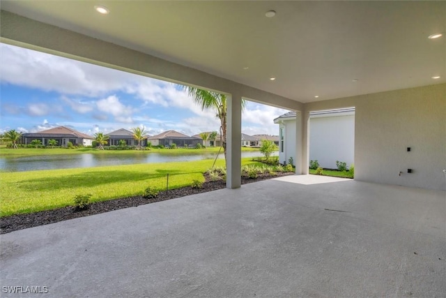 11902 Raggio Dr, Fort Myers, FL 33913 - view of patio with a water view and a residential view