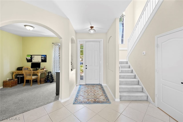 view of carpeted entrance foyer