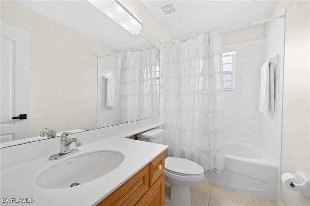 full bathroom with tile patterned flooring, shower / bath combination with curtain, toilet, vanity, and visible vents