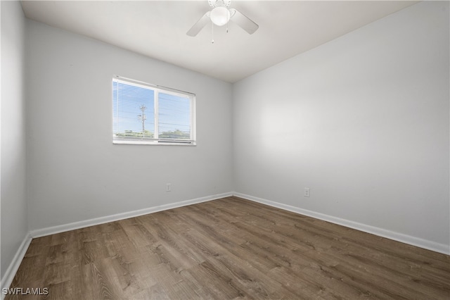 empty room featuring wood-type flooring and ceiling fan