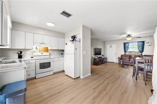 kitchen with white appliances, light hardwood / wood-style floors, sink, white cabinetry, and ceiling fan