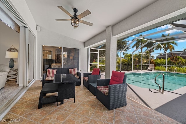 view of patio with a lanai, an outdoor hangout area, and ceiling fan