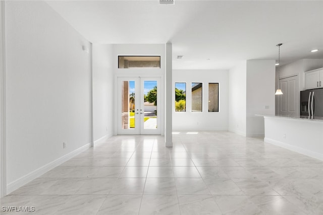 spare room with french doors