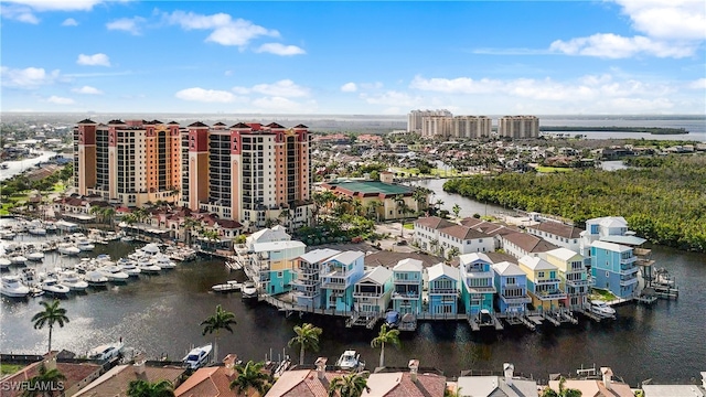 birds eye view of property featuring a water view