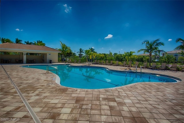 view of pool featuring a patio