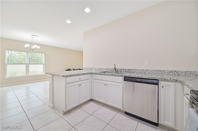 kitchen with appliances with stainless steel finishes, white cabinetry, a chandelier, and kitchen peninsula