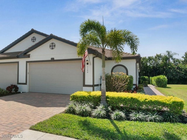 view of front of home with a garage