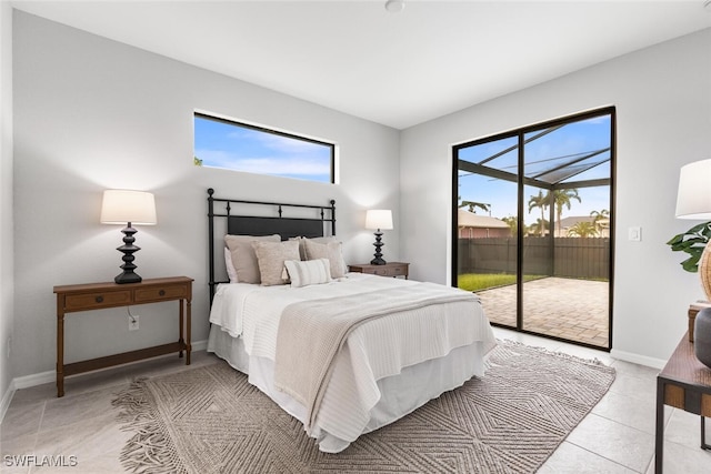 bedroom with access to outside, baseboards, and light tile patterned flooring