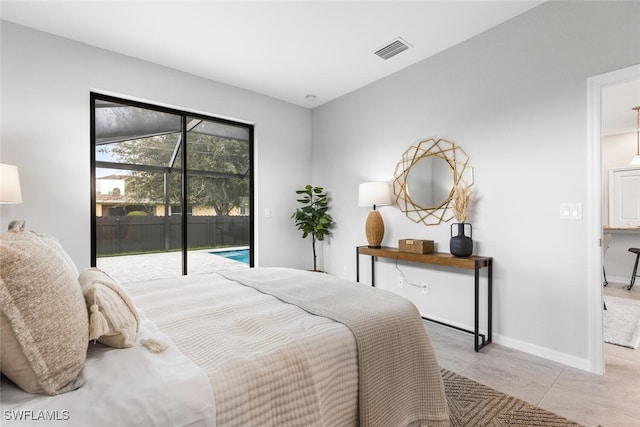 bedroom with access to outside, visible vents, and baseboards