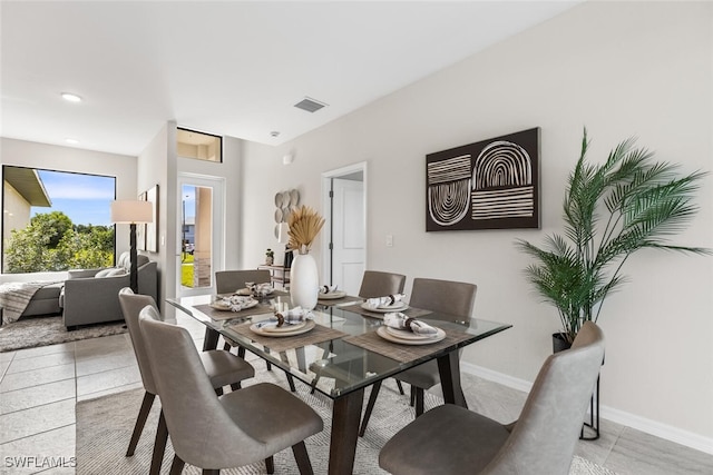 dining room with light tile patterned floors