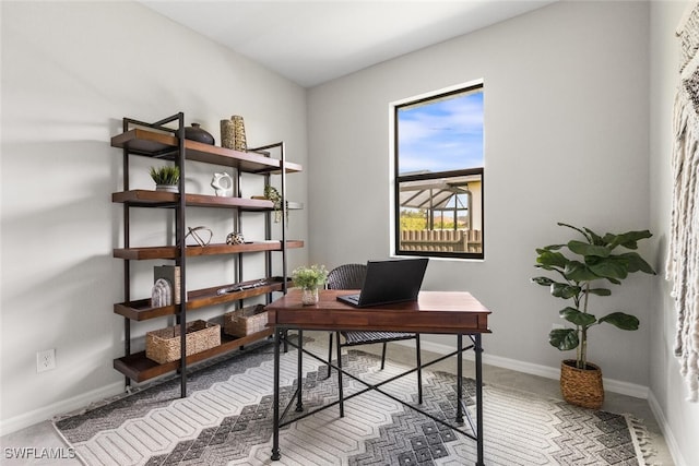 office area featuring baseboards