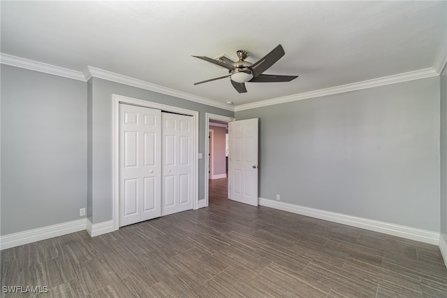 unfurnished bedroom featuring a closet, ceiling fan, dark hardwood / wood-style floors, and ornamental molding