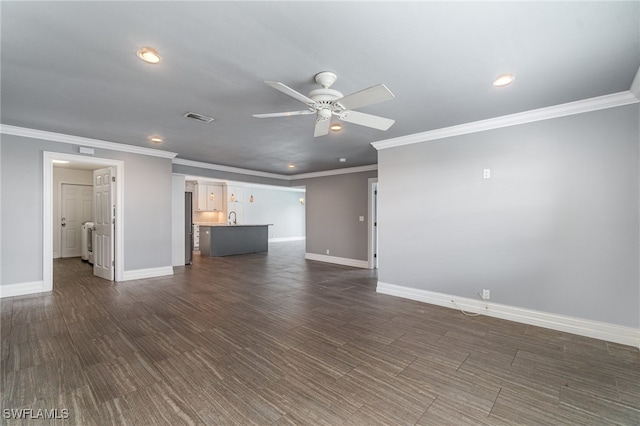 unfurnished living room featuring ceiling fan, ornamental molding, and dark hardwood / wood-style flooring