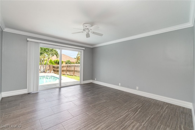 spare room with ornamental molding, ceiling fan, and dark hardwood / wood-style floors