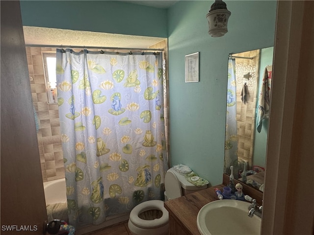 full bathroom with vanity, toilet, and shower / tub combo with curtain