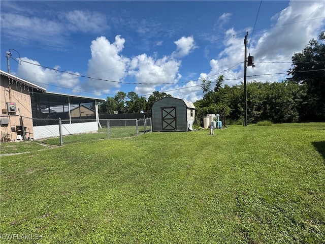 view of yard with a storage shed