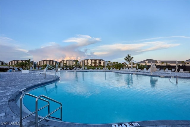 view of swimming pool featuring a patio area