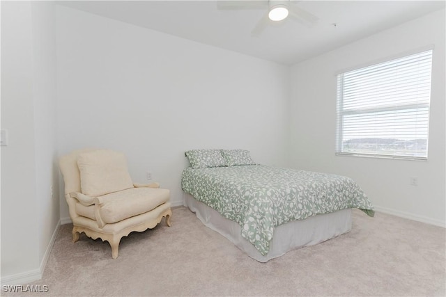 bedroom featuring ceiling fan and carpet floors