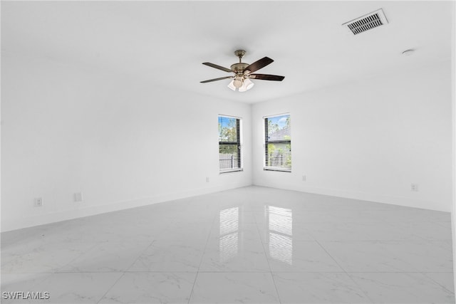 unfurnished room featuring ceiling fan