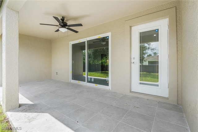 view of patio / terrace featuring ceiling fan