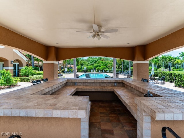 view of patio / terrace with ceiling fan