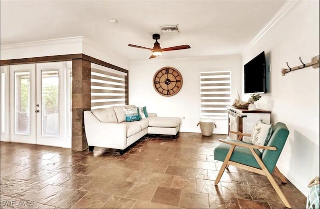 1797 42nd Ter SW, Naples, FL 34116 - living area featuring stone tile floors, crown molding, french doors, and a ceiling fan