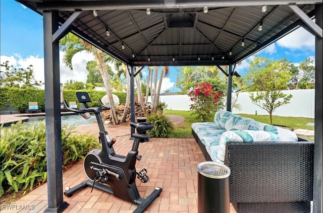 1797 42nd Ter SW, Naples, FL 34116 - view of patio with a fenced backyard and a gazebo