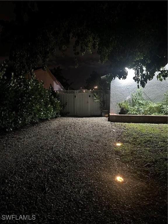 1797 42nd Ter SW, Naples, FL 34116 - view of yard with fence and a gate