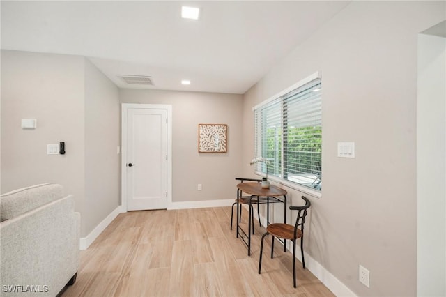 8339 Estero Blvd, Fort Myers Beach, FL 33931 - hall featuring light wood-style flooring, baseboards, and visible vents