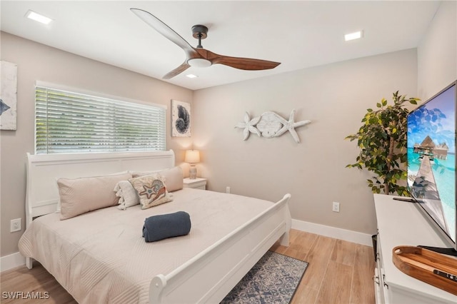 8339 Estero Blvd, Fort Myers Beach, FL 33931 - bedroom with baseboards, light wood-style floors, and ceiling fan