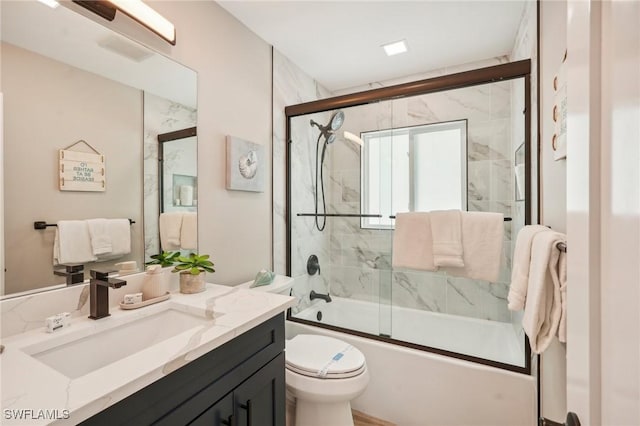 8339 Estero Blvd, Fort Myers Beach, FL 33931 - bathroom with vanity, toilet, and shower / bath combination with glass door