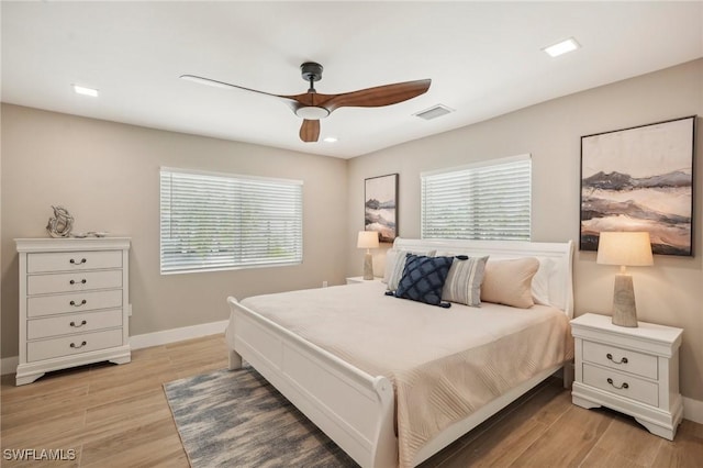 8339 Estero Blvd, Fort Myers Beach, FL 33931 - bedroom featuring visible vents, baseboards, a ceiling fan, and light wood finished floors