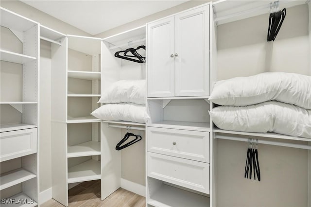 8339 Estero Blvd, Fort Myers Beach, FL 33931 - walk in closet with light wood finished floors