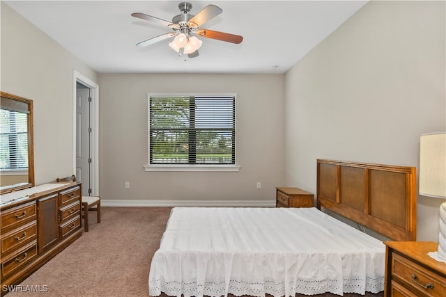 bedroom featuring ceiling fan and carpet flooring