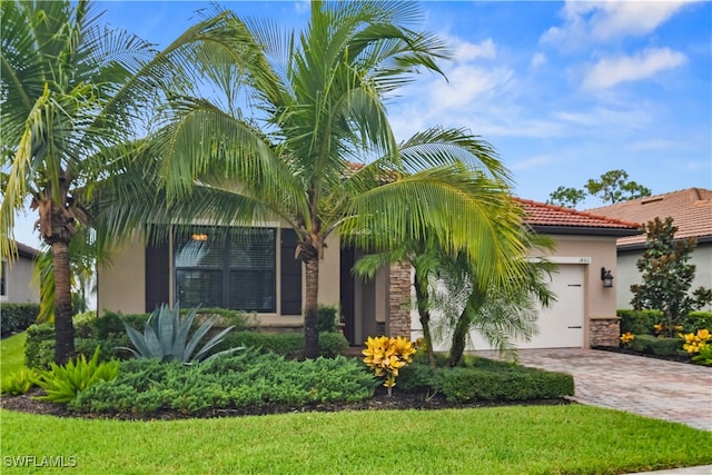 view of front of property with a garage