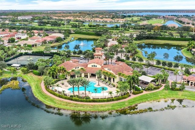 birds eye view of property featuring a residential view and a water view