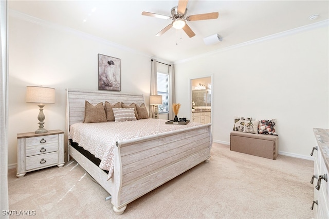 bedroom with ornamental molding, light carpet, connected bathroom, ceiling fan, and baseboards