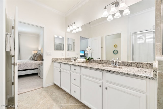 full bathroom with ensuite bath, ornamental molding, and a sink