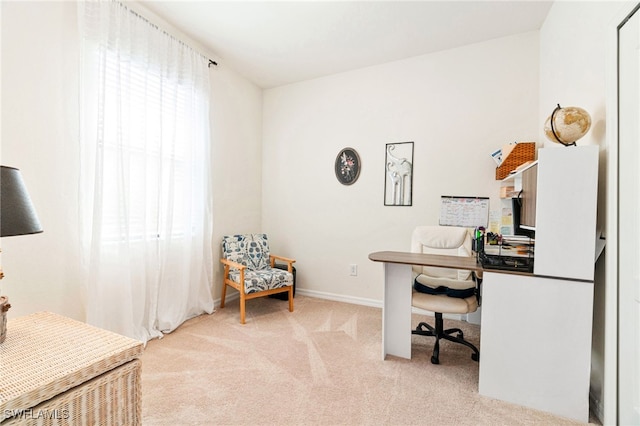 office area with baseboards and light colored carpet