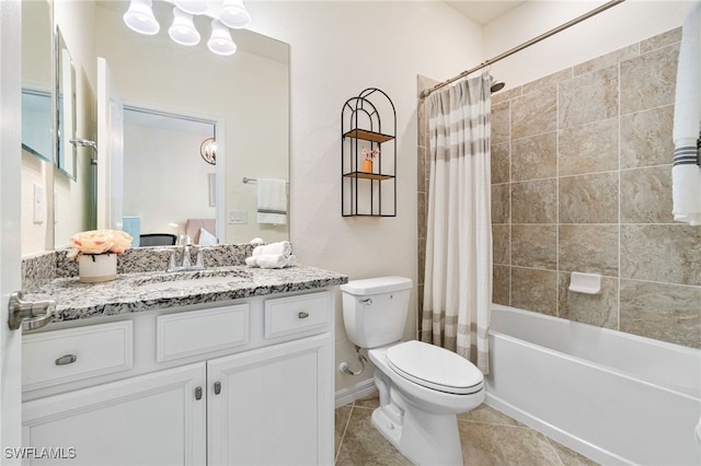 ensuite bathroom with toilet, shower / bath combo with shower curtain, vanity, ensuite bath, and tile patterned flooring