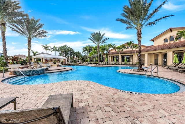 community pool featuring a patio area and a gazebo