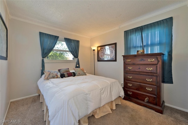 carpeted bedroom with baseboards, ornamental molding, and a textured ceiling