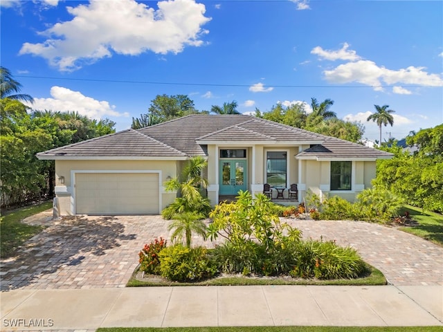 view of front of home with a garage