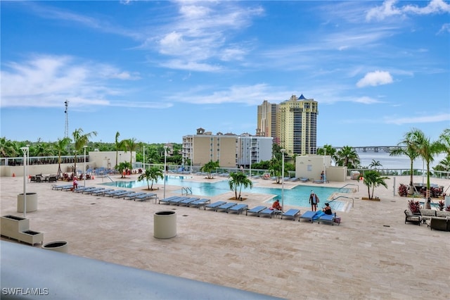 view of swimming pool with a patio